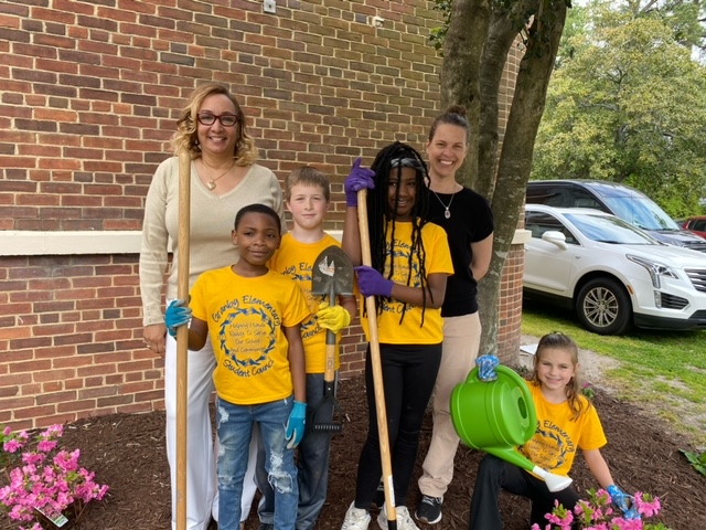  This image show SCA Members are Granby ES with the principal and sponsor